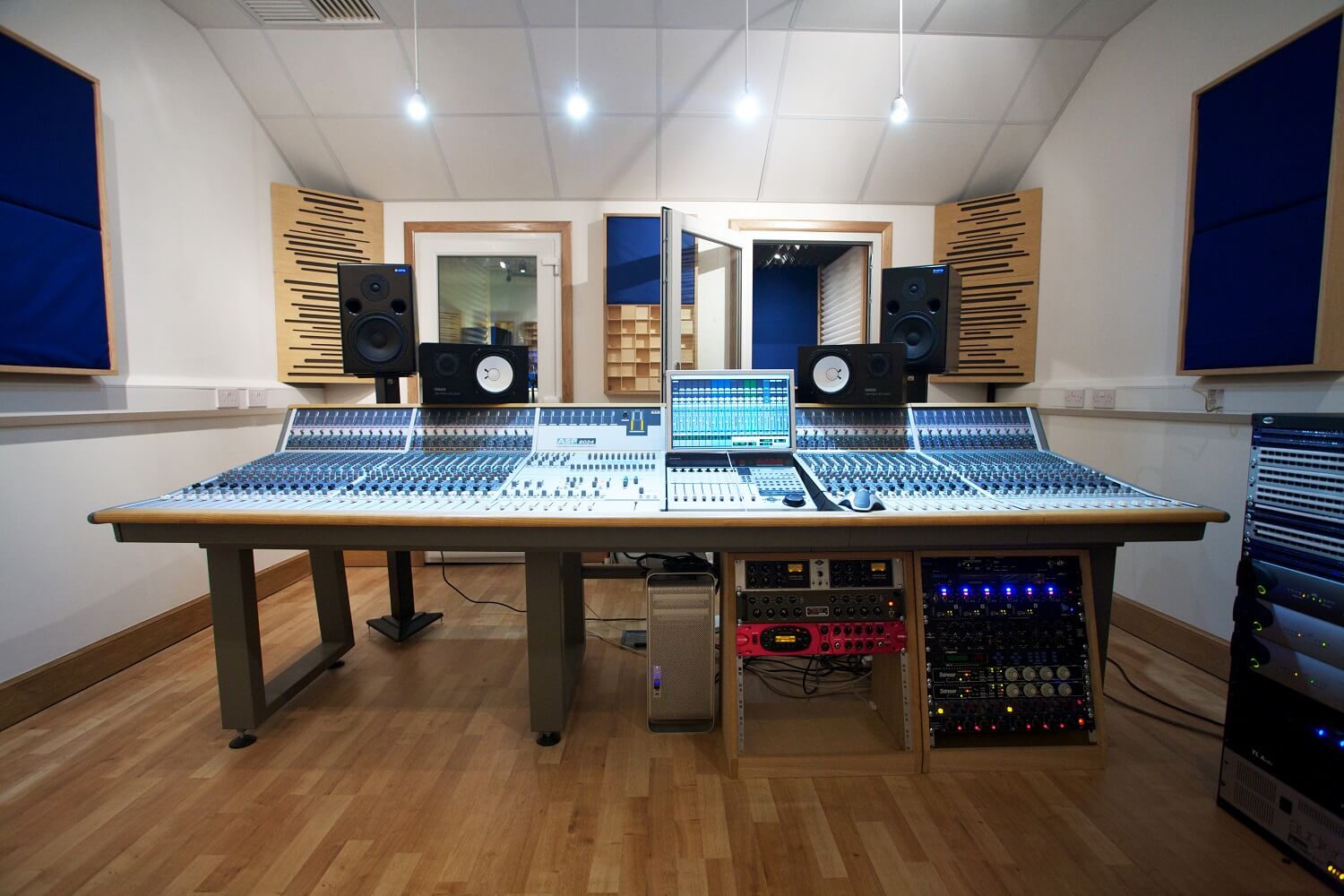 Audient mixing desk in brightly lit studio