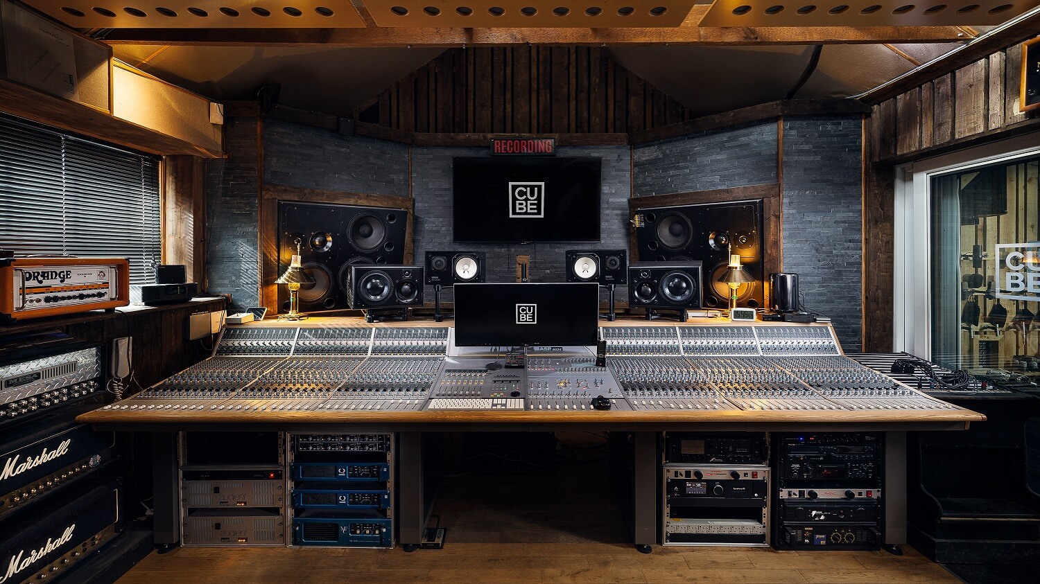 72 channel mixing console in a stunning studio setting