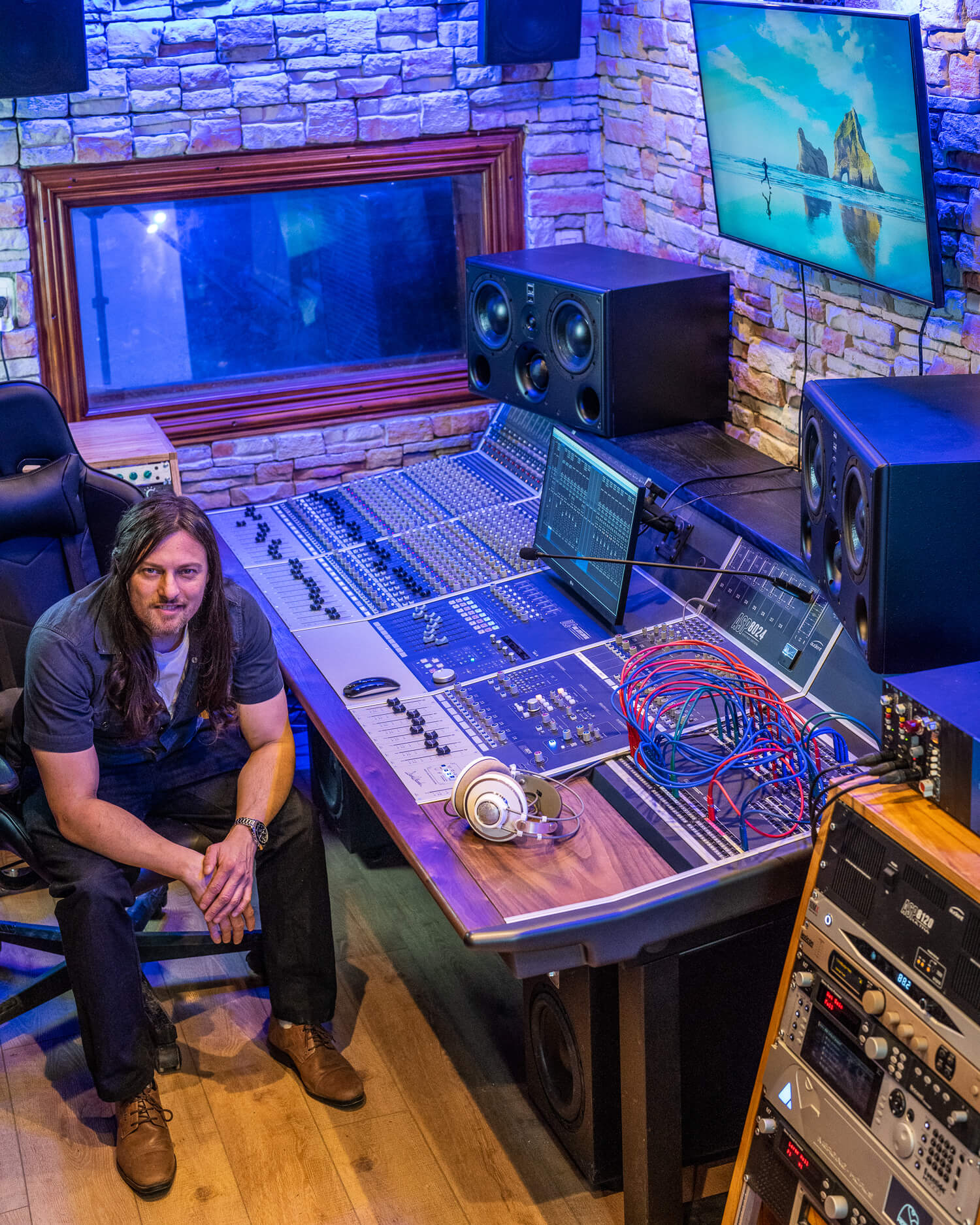 Jonatan Montes sits at his new Audient mixing console