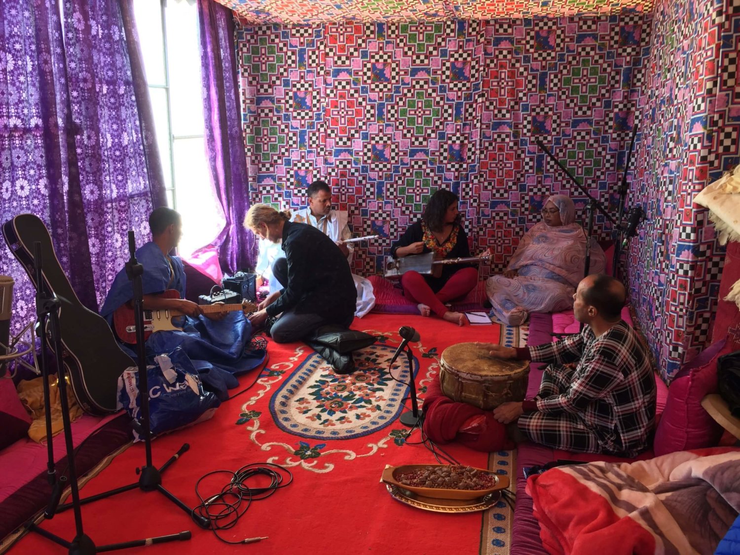 Beautiful carpeted and draped tent full of musicians and Hit The Road Studio cables/mics etc