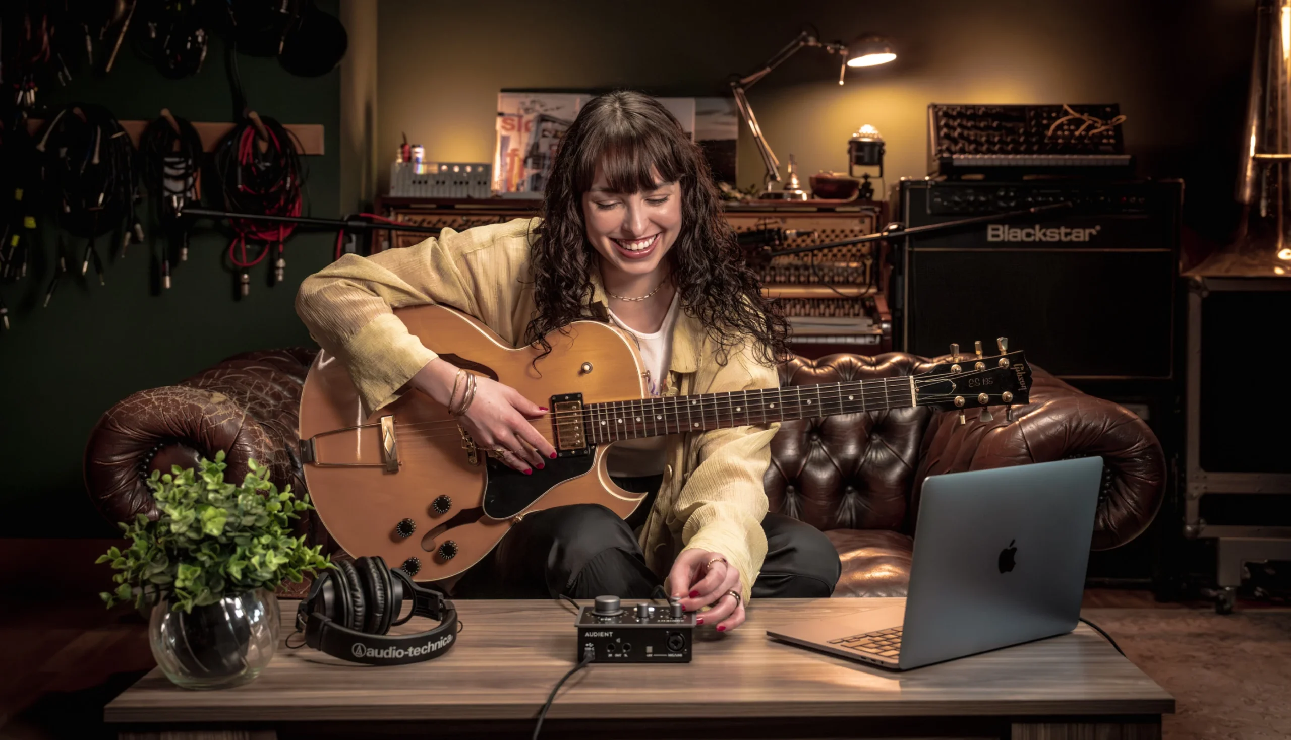 A guitarist using the iD4 Audio Interface