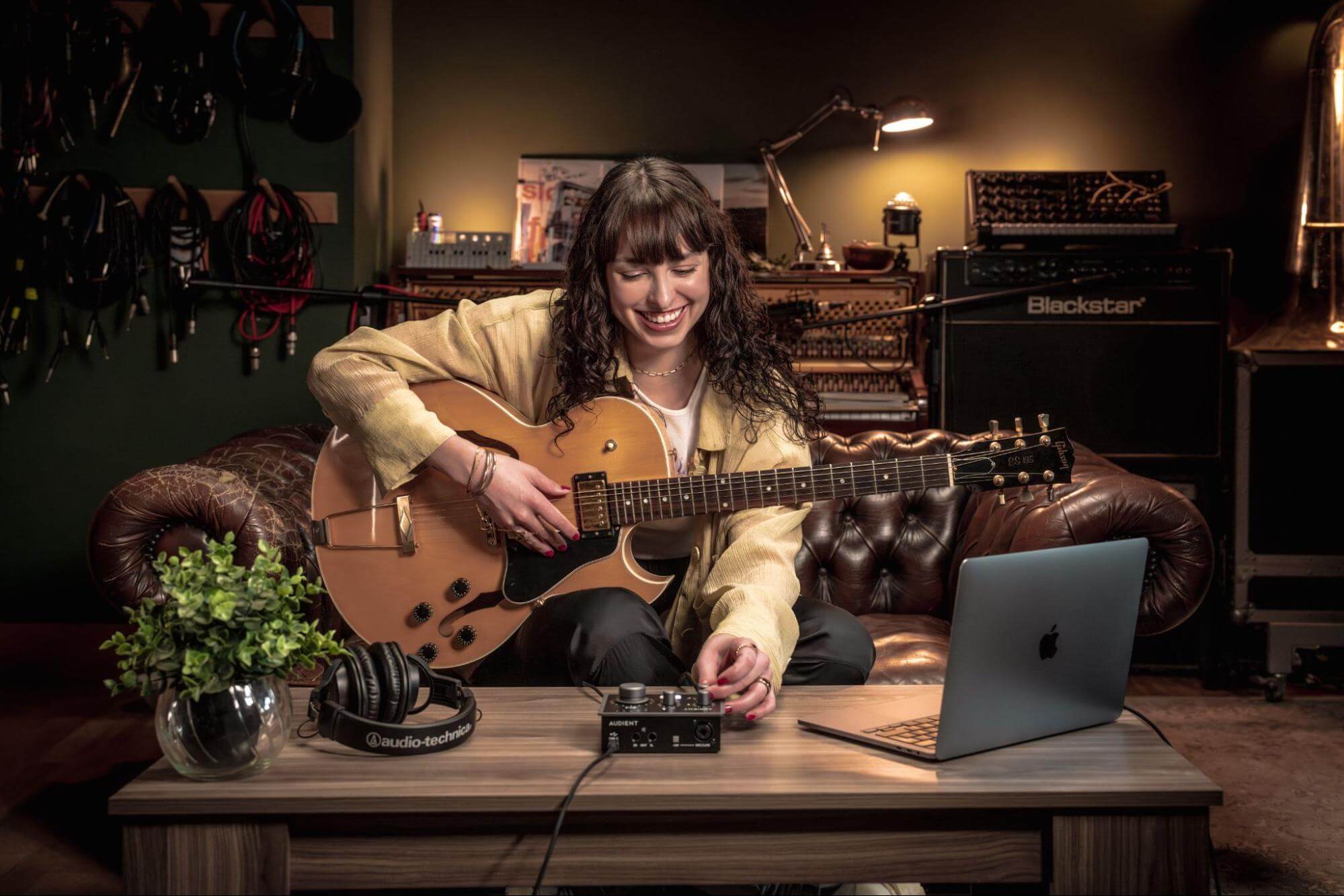 Guitarist using an iD4 Audio Interface